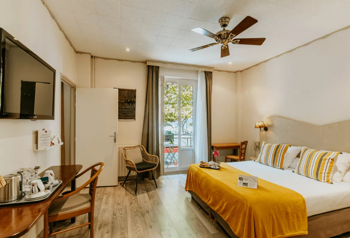 Photo d'une chambre familiale de l'hôtel Iroko à Aix les Bains.